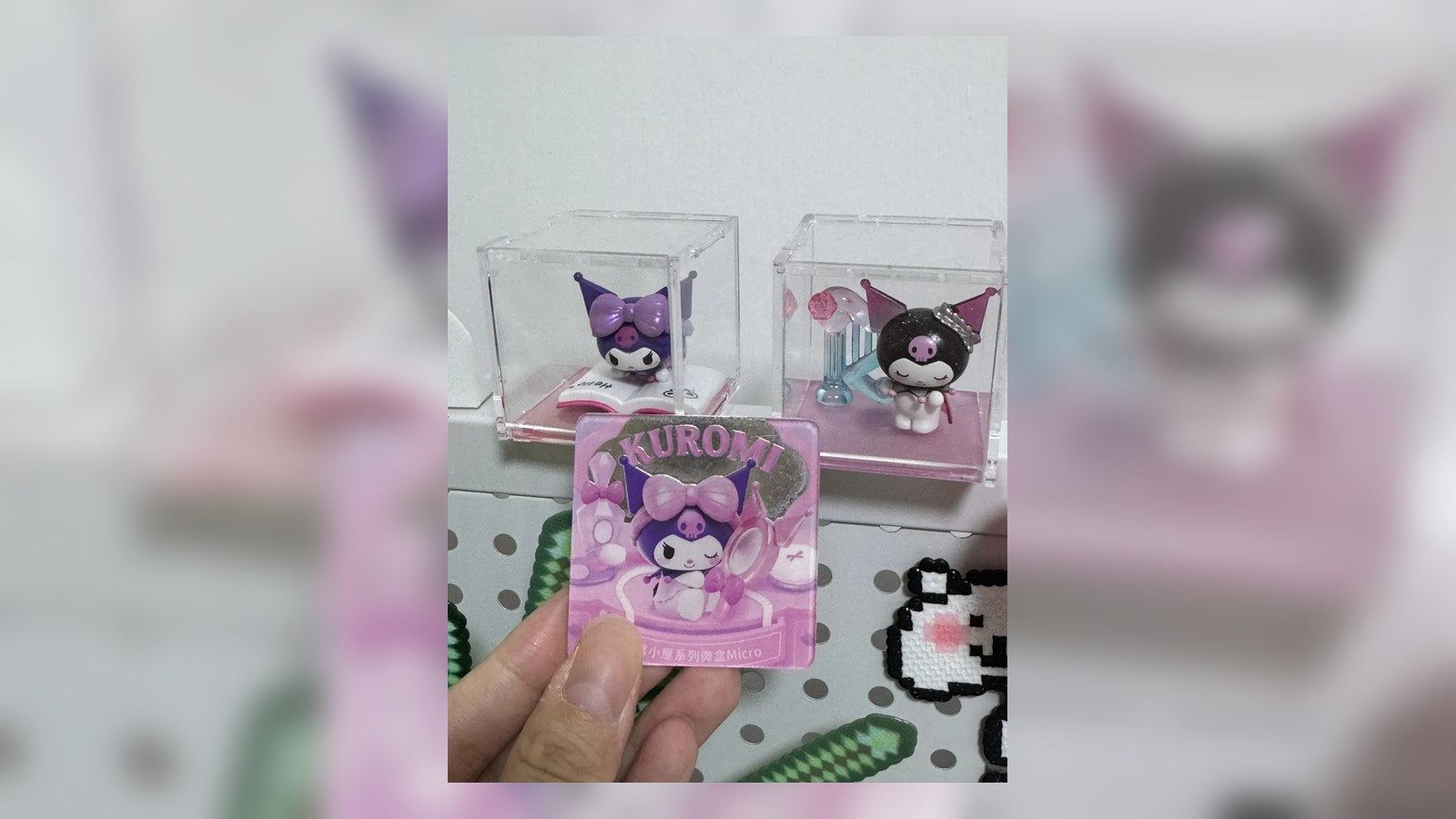 Finished DIY magnet display made from a card wrapper.