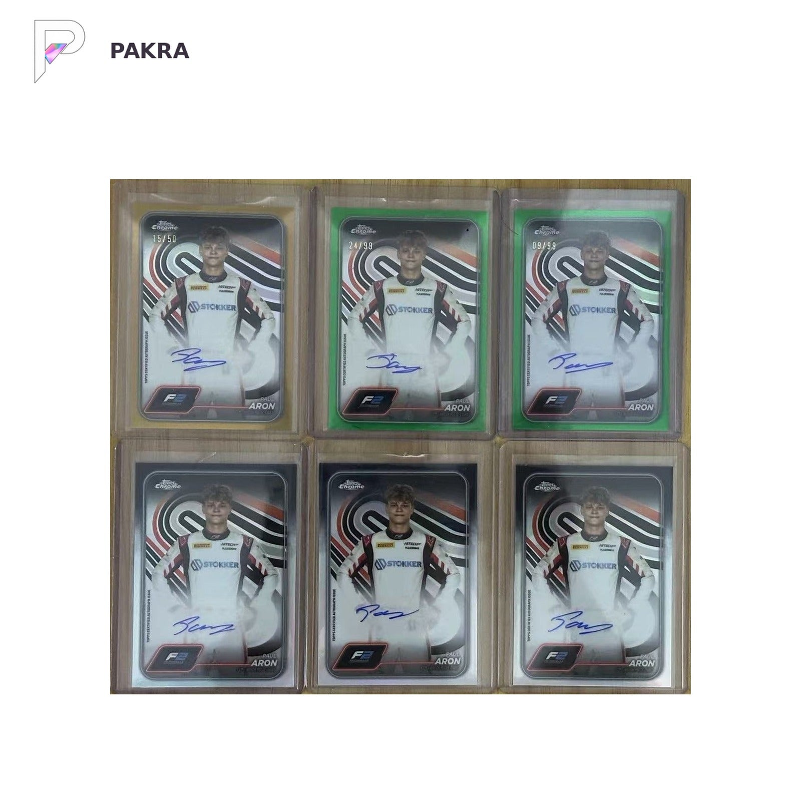 Paul Aron 2024Topps Chrome Formula 1 Green Gold Refractor Auto /99 /50 lots 6 FZ shown on a white PAKRA background.