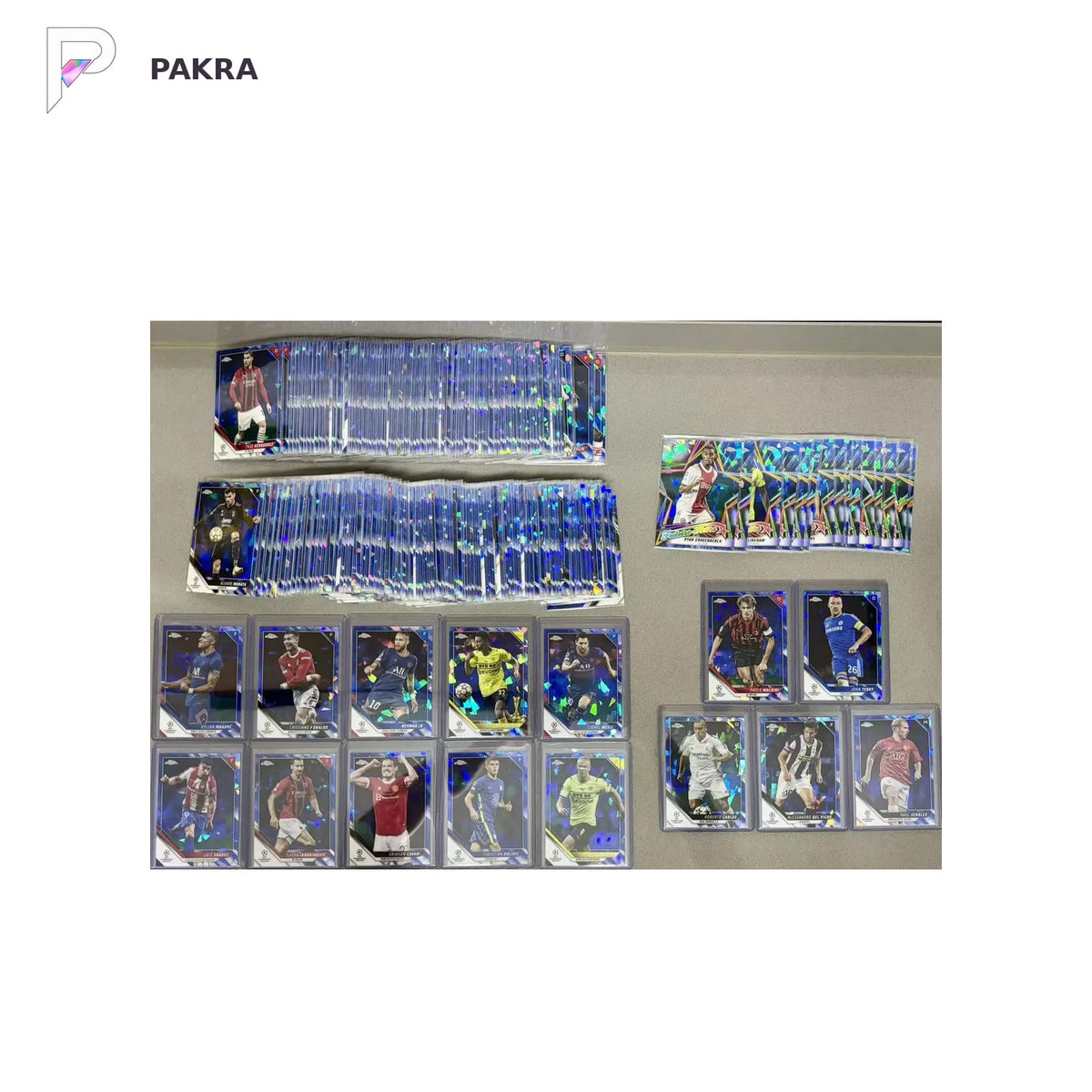 2021 Topps Chrome Sapphire UEFA Base Set 1-200 + SPL1-L5+Future Stars Set Messi shown on a white PAKRA background.