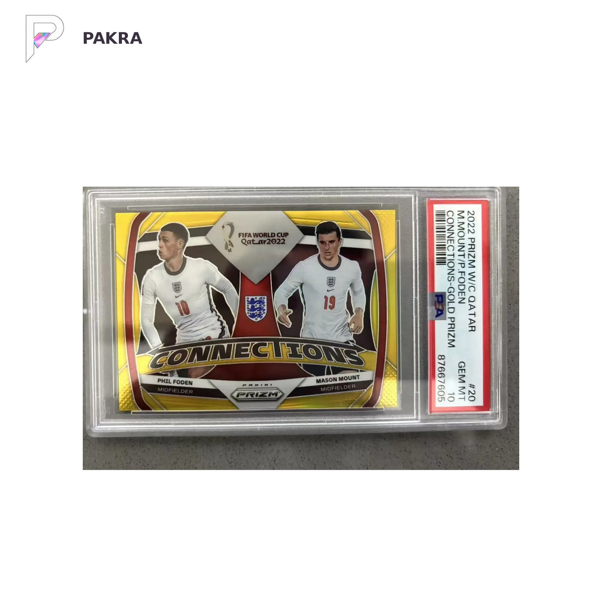 2022 Panini Prizm Word Cup Qatar Mount / Foden Connections Gold 09/10 shown on a white PAKRA background.