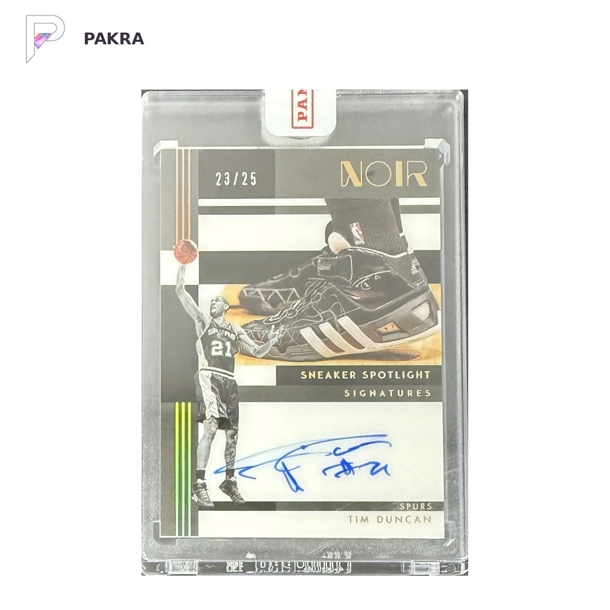 2024-25 Panini Noir Sneaker Spotlight #SSS-TIM Tim Duncan Auto 23/25 Sealed shown on a white PAKRA background.