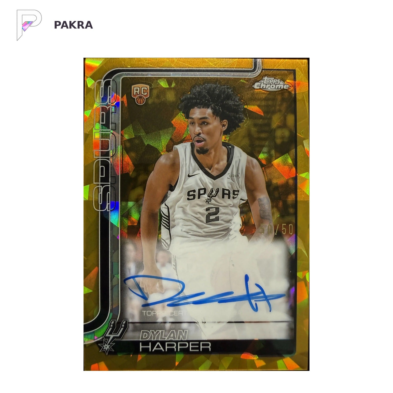 2025-26 Topps Chrome Sapphire Gold Dylan Harper RC Rookie Auto 50/50 Spurs shown on a white PAKRA background.