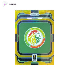2026 Panini Prizm FIFA World Cup Team Badges SENEGAL 05/10 gold #39 shown on a white PAKRA background.