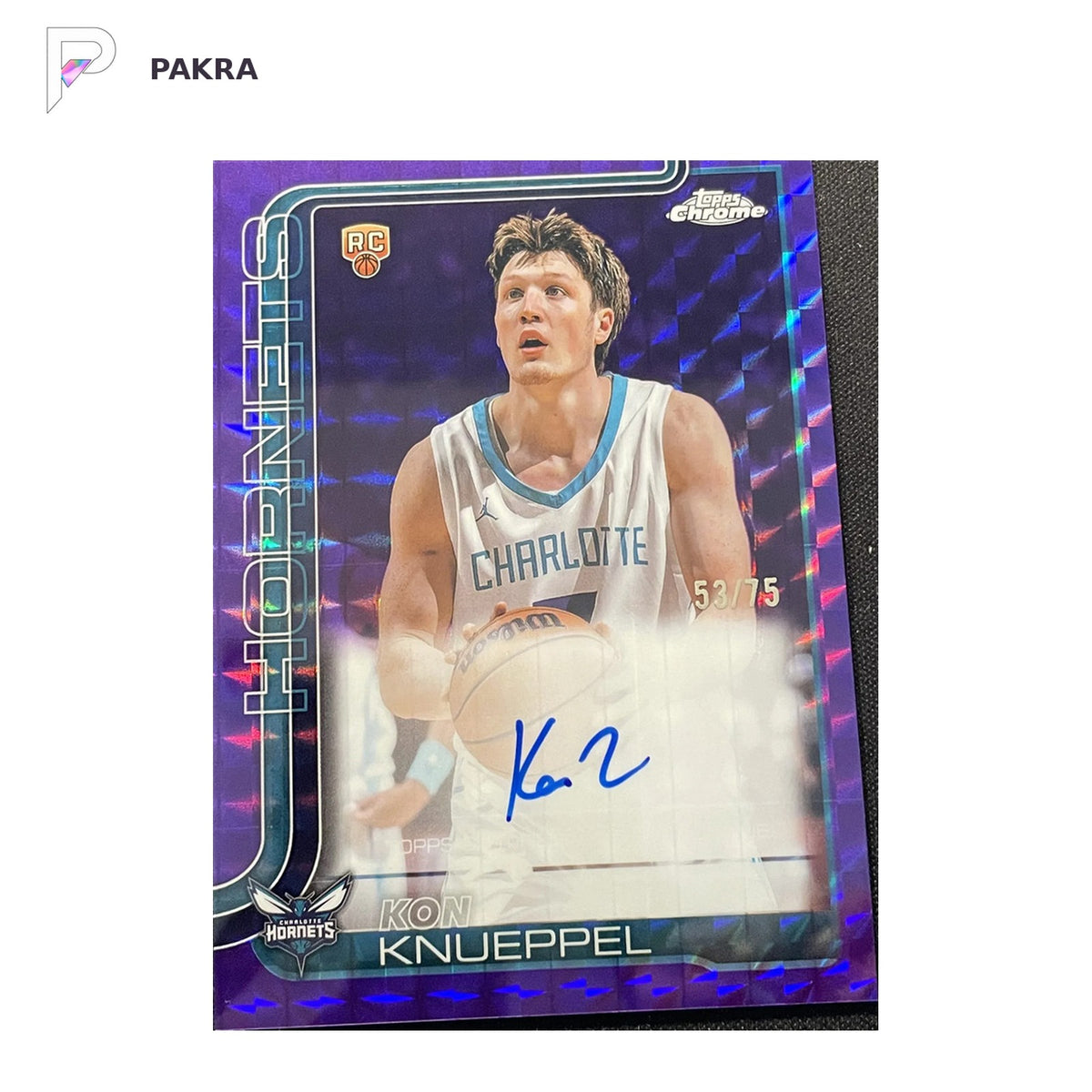 2025-26 Topps Chrome Auto Kon Knueppel RC #TCAR-KK Purple Geometric 53/75 shown on a white PAKRA background.