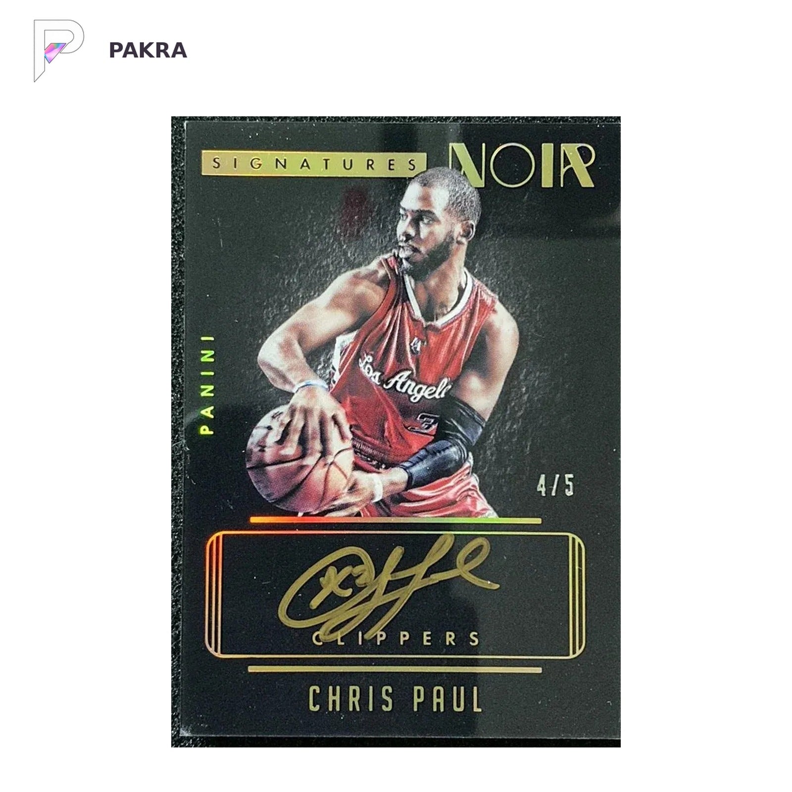 2014-15 Panini Noir Chris Paul Auto Noir Color Gold 4/5 #NC-CP Clippers shown on a white PAKRA background.