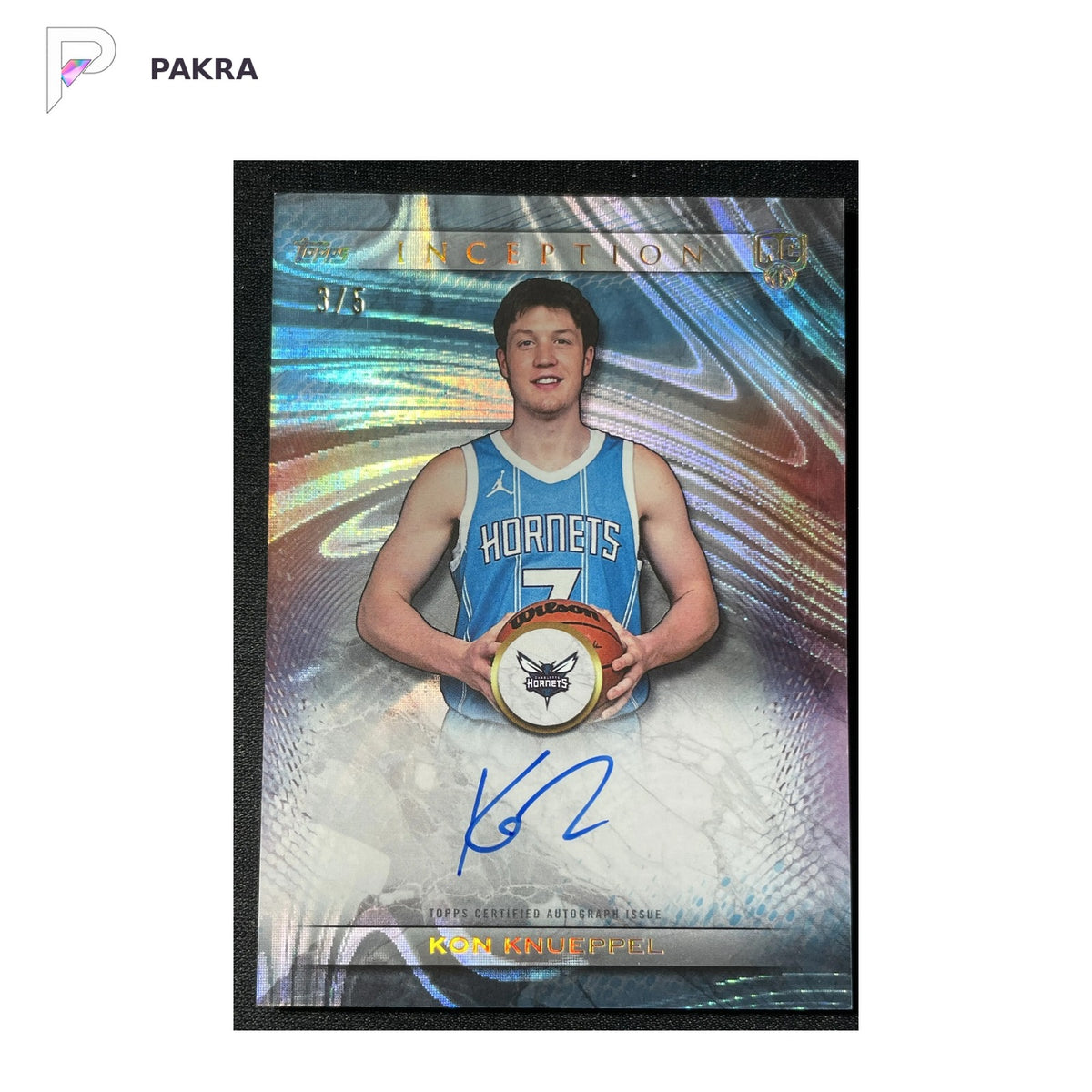 2025-26 Topps Inception Kon Knueppel RC Rookie Auto Sky Blue 3/5 #RA-KK shown on a white PAKRA background.