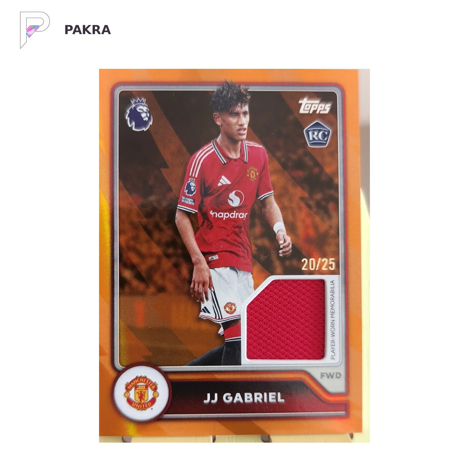 JJ Gabriel 2026 Topps Flagship Premier League Relic Orange 20/25 RC England shown on a white PAKRA background.