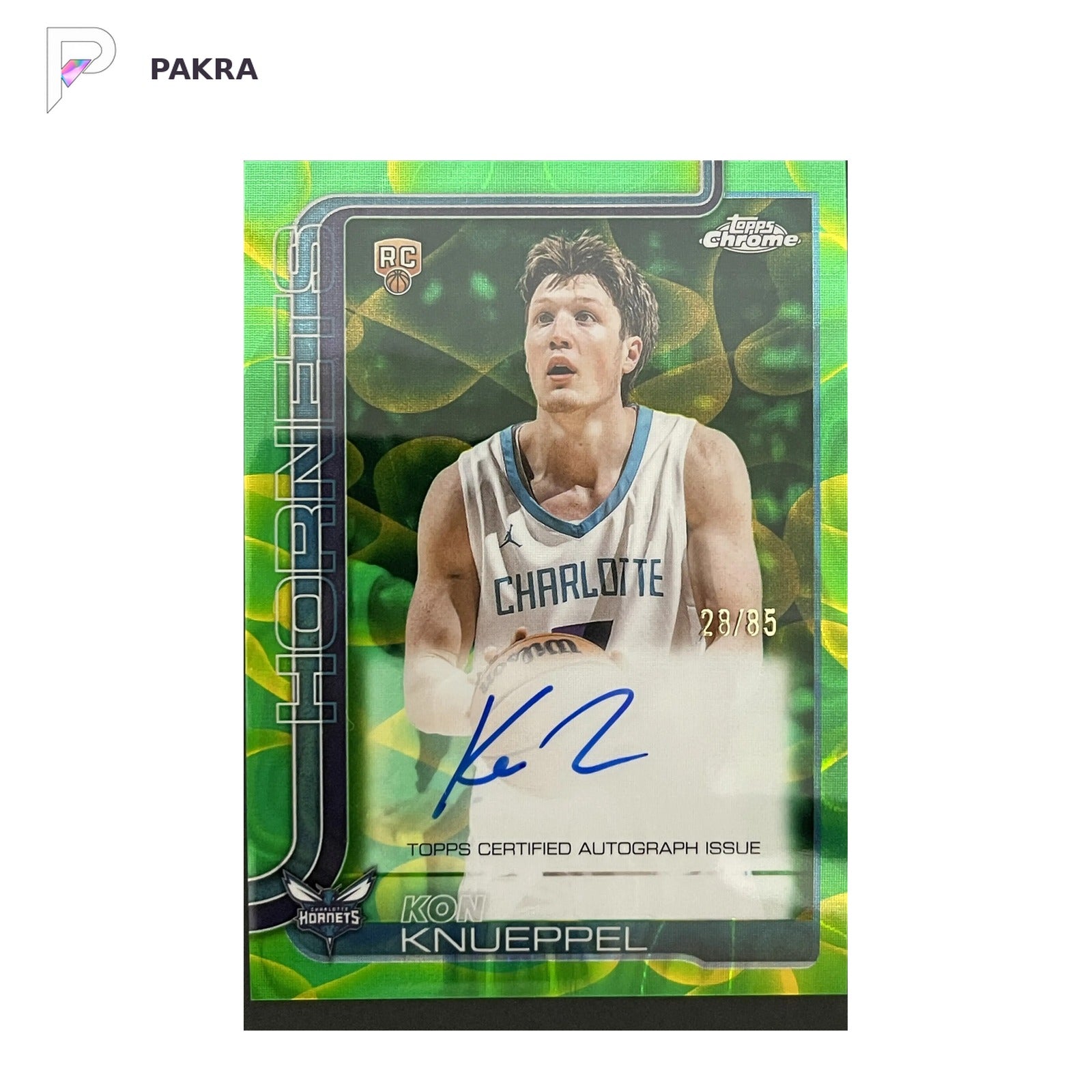 2025-26 Topps Chrome Update Kon Knueppel RC Auto Green/Yellow Lava Lamp /85 shown on a white PAKRA background.