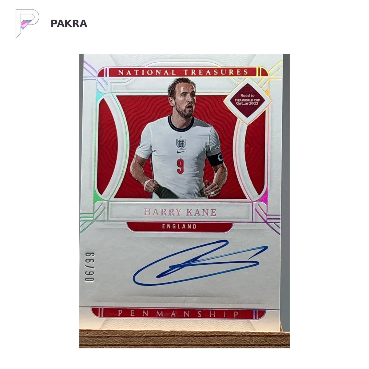 2022 Panini National Treasures FIFA World Cup Harry Kane Auto /99 shown on a white PAKRA background.