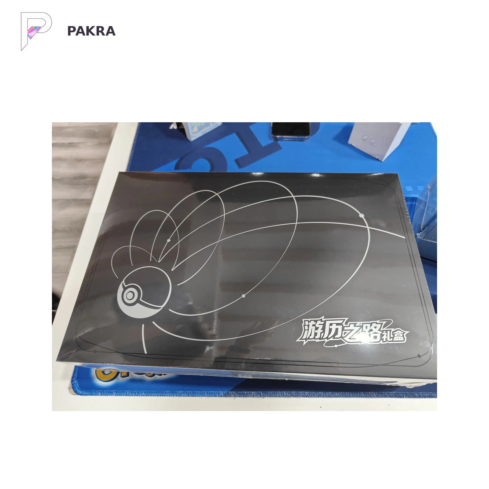 Pokémon TCG Travel Journey Gift Box - Simplified Chinese, official product image on a white PAKRA background.