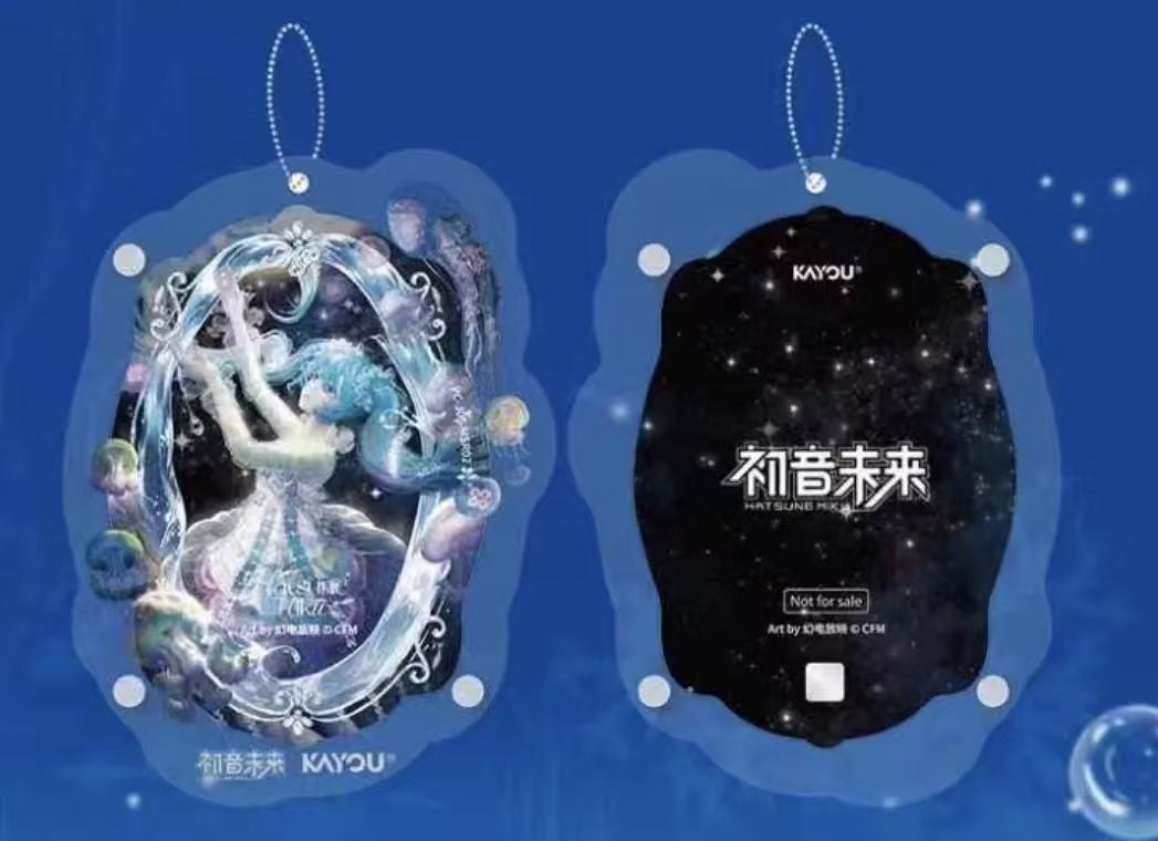Reference image of the blue KAYOU Hatsune Miku shaped card holder, front and back. Cards shown are for illustration only and are not included.
