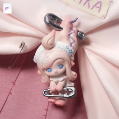 CHAKA Stitch by Stitch Safety Pin figure, official detail photograph with PAKRA logo; background props are not included